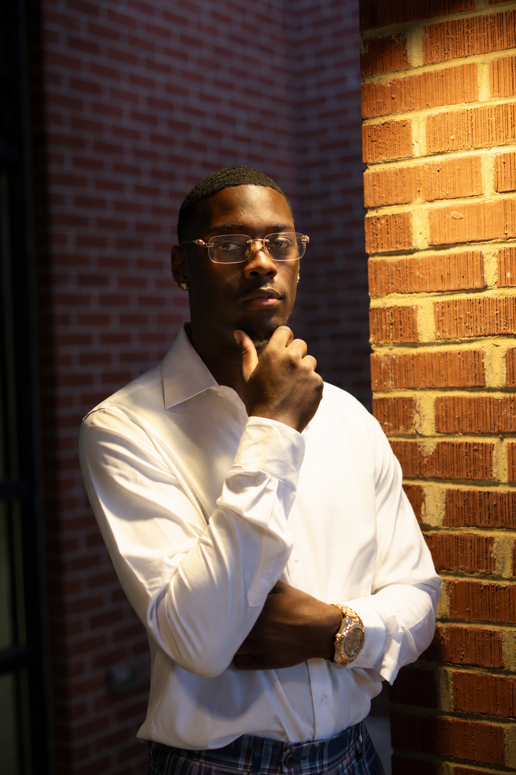 Portrait against brick wall