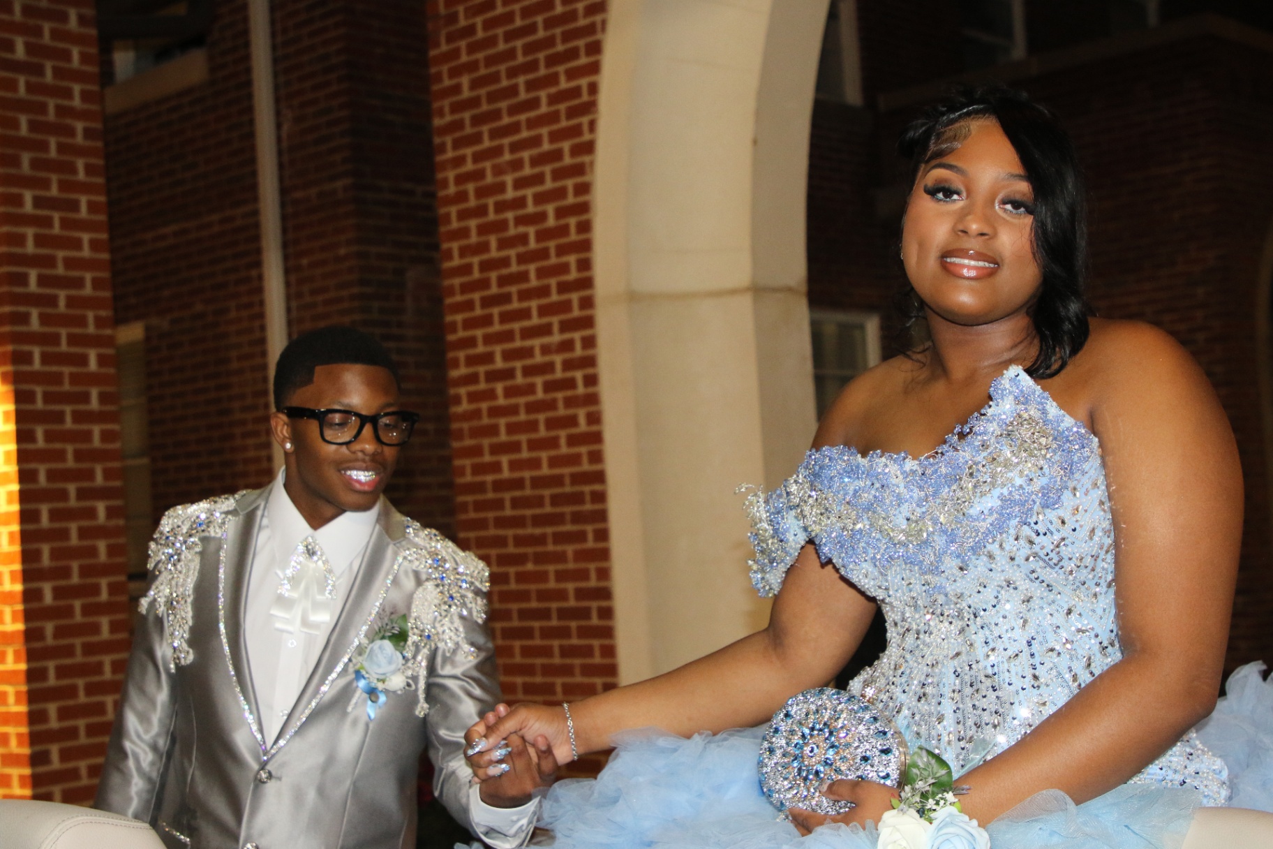 Prom couple in archway