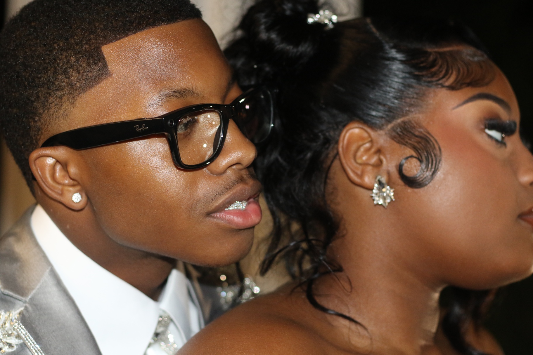 Prom couple side profile close-up with Ray-Bans